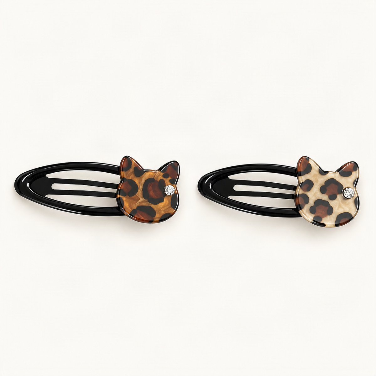 Chocolate Leopard and Latte Leopard cat hair clips together on warm ivory [FITINY Hair]