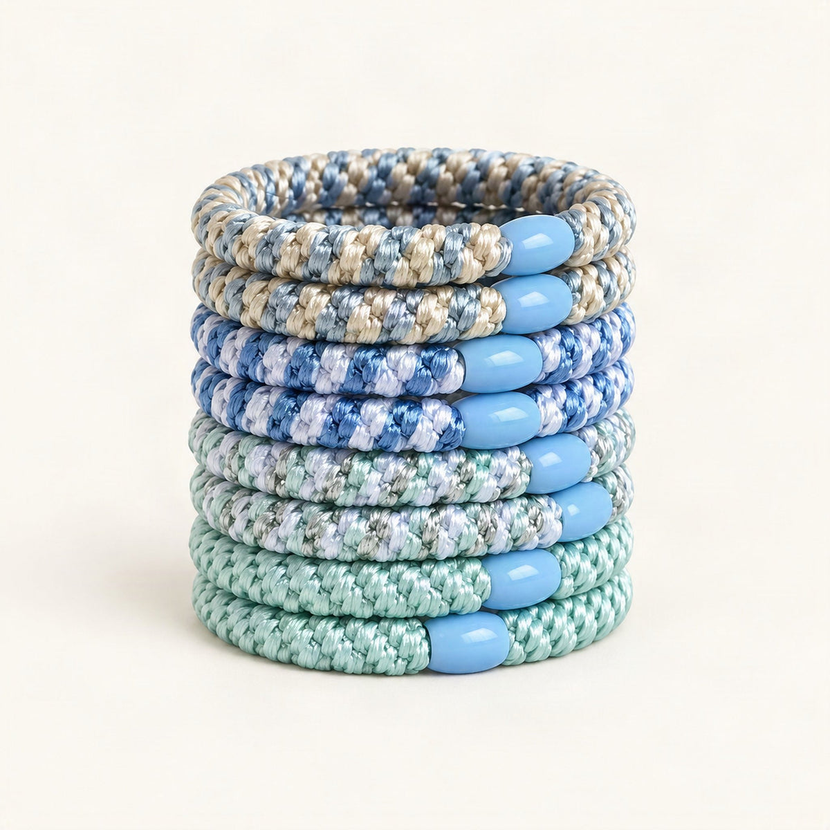Braided Elastic Hair Tie — Pastel Mix variant on a warm ivory background [FITINY Hair]